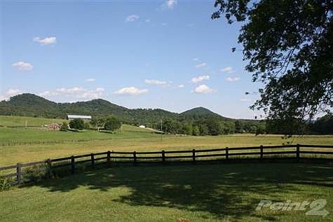 Front porch view over looks paster and Mountains