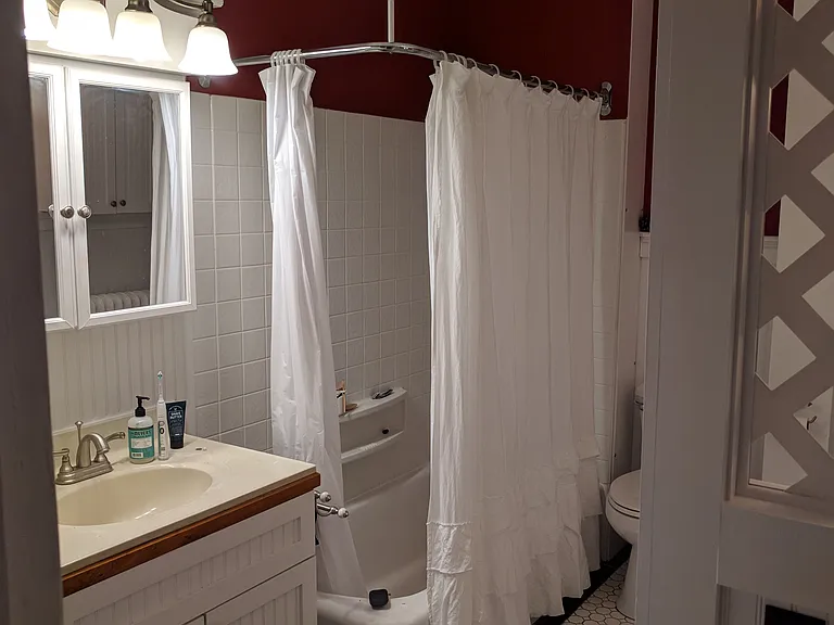 Well lit bathroom. Note the vibrant colors!
