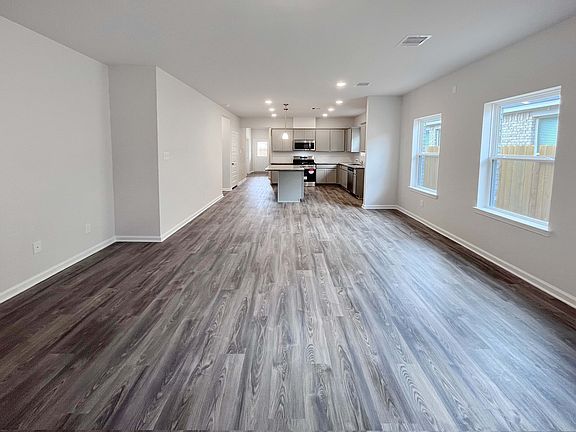 The Mockingbird II- Family Room into Dining Area and Kitchen