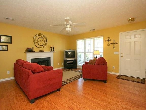 Spacious Open Family Room with hardwoods, fireplace and gas logs. 