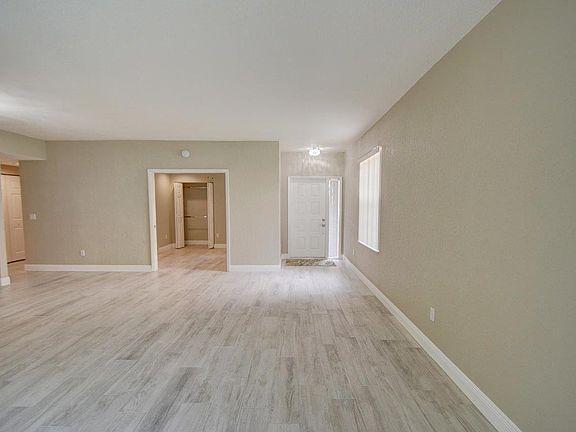 Porcelain tile throughout the whole house that looks like wo