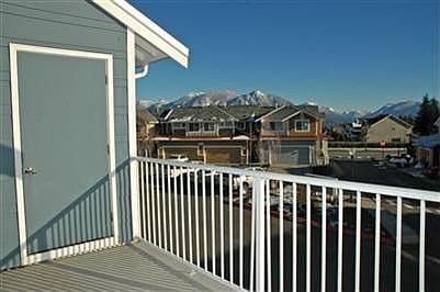 View of Cascades and Mt. Si from the deck