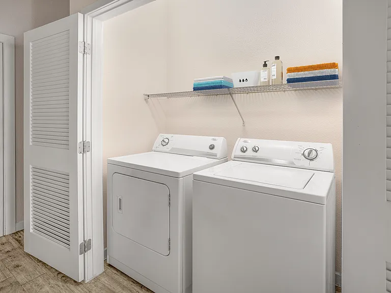 Simplify your routine with a washer and dryer inside your home.