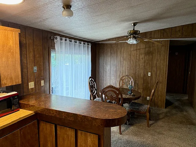 Dining Room with a sliding door to the back yard. Receives morning sun.