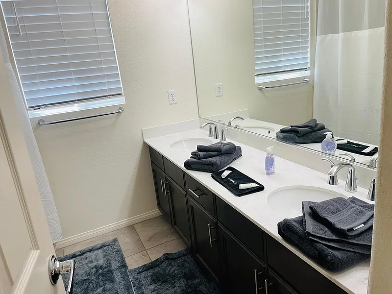 Dual sinks allow two people to have their own space.
