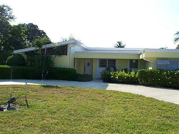 Exterior Front. Circular driveway