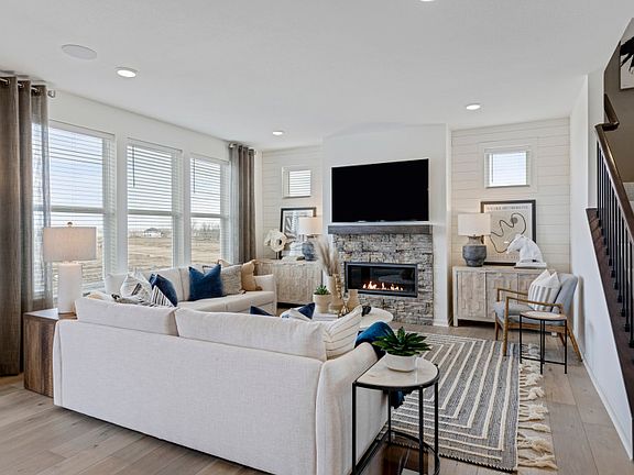 Cozy Gathering Room with a Fireplace, Perfect for Family Movie Night