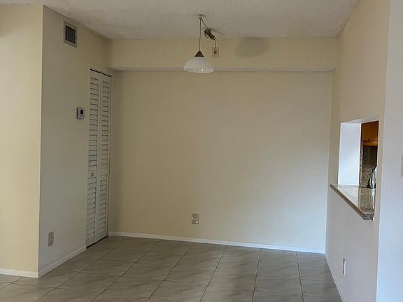 Dining area and A/C unit to the left.