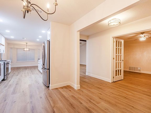 Spacious office with french doors for privacy.