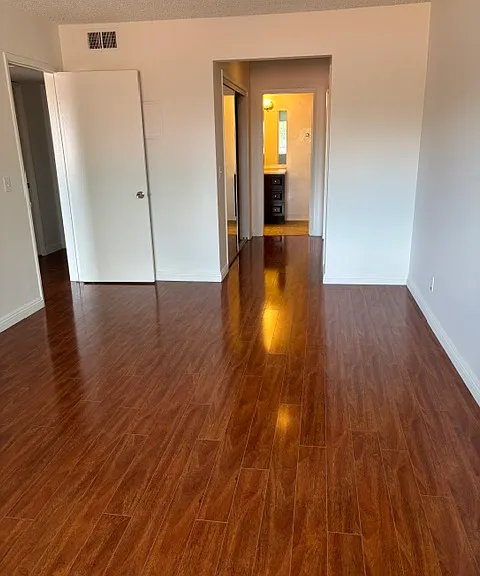 Master bedroom w/his and hers closets