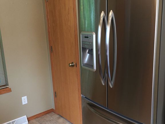 High End Refridg and Door to Pantry