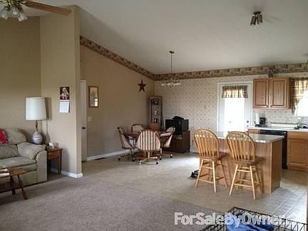 Front Door Entrance
						:
						To the right is TV mounted on wall and looking into breakfast nook.