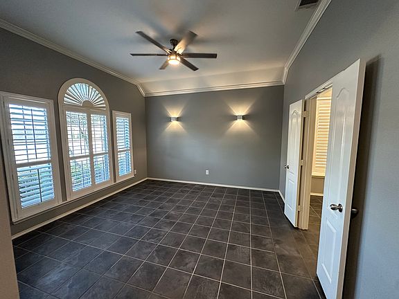 Large dining room with plenty of natural light opens to the kitchen. Could also be utilized as an office, gym or bonus room.
