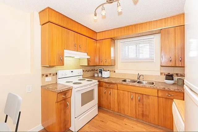 153 Woodvale Road West NW — Photo 42