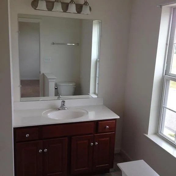 Bathroom attached to master Bedroom. Includes bath tub/shower.