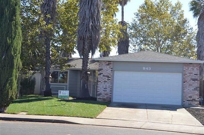 FRONT OF HOUSE W/NEW LAWN