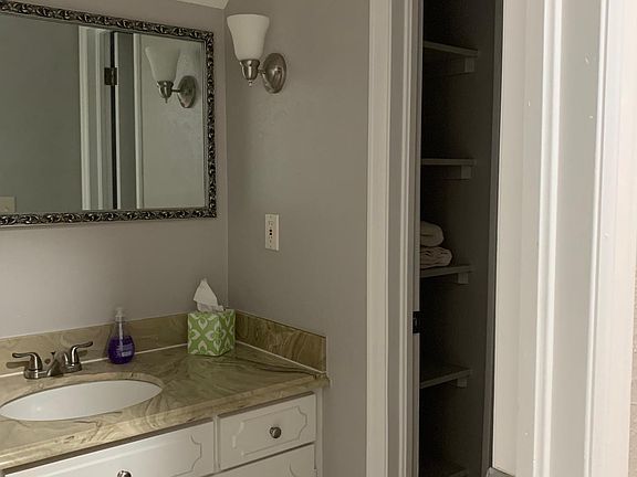 Bathroom with tub and shower