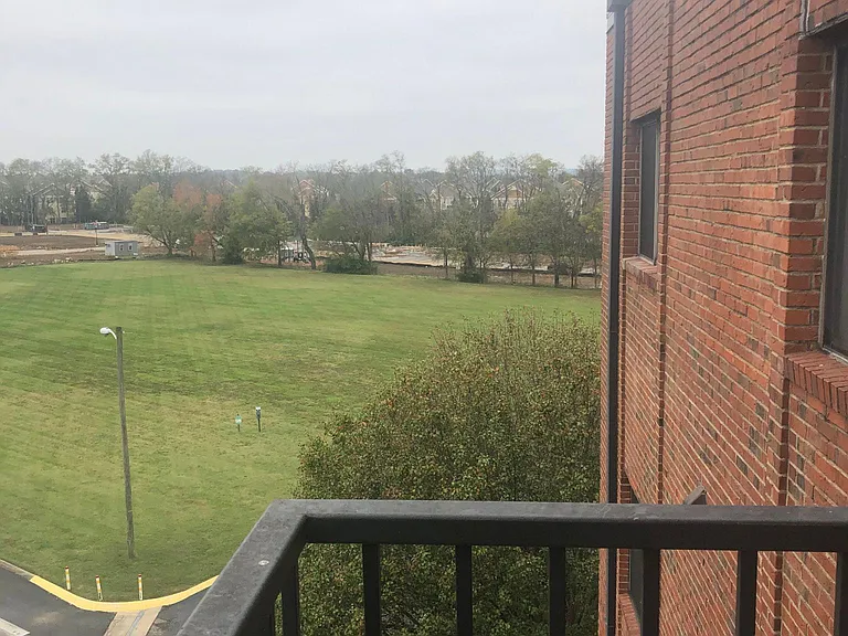 Balcony overlooking dog park