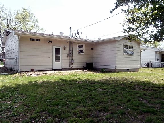 Rear, fenced, shed
