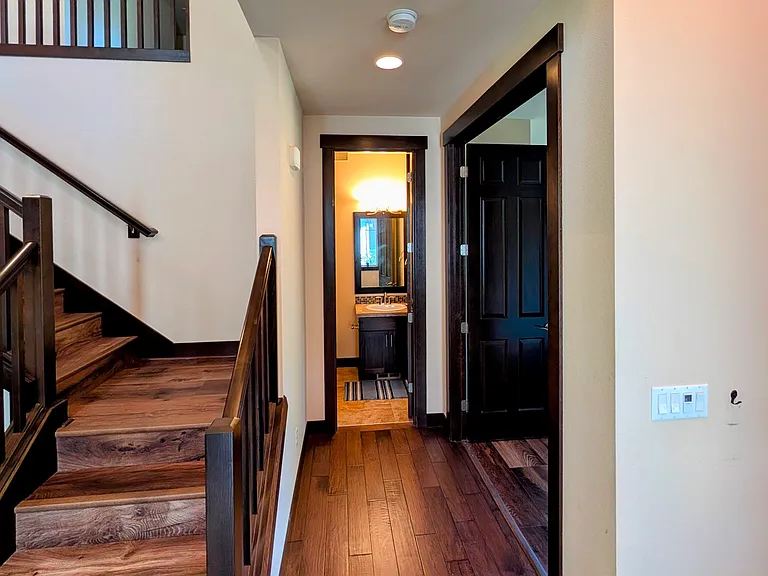 3/4 bath with den/guest room on Main floor. Use it as work from home office, or as a bedroom for those with difficulty climbing stairs.