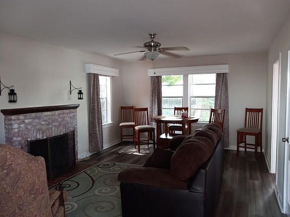 Large 450 square foot living room with fireplace, Samsung 40" smart t.v. and internet service