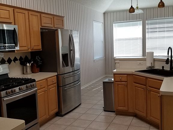 Kitchen facing eating area
