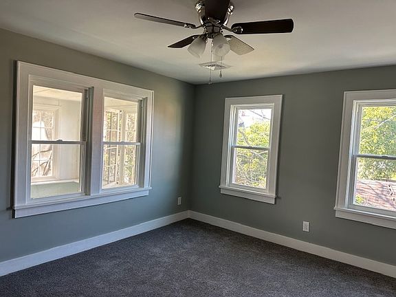 Bright and cheerful living room. All windows have been replaced.