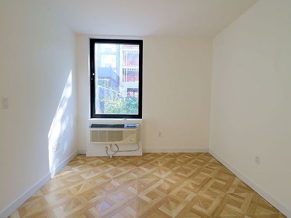 3rd image of 316 E 3rd St APT 2D