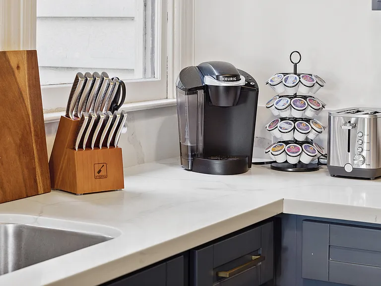Chef-ready kitchen with modern appliances, cookware, cutlery, glassware, and everything else you need to feel at home immediately.
