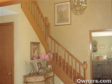 Entryway with Solid Hardwood Stairs