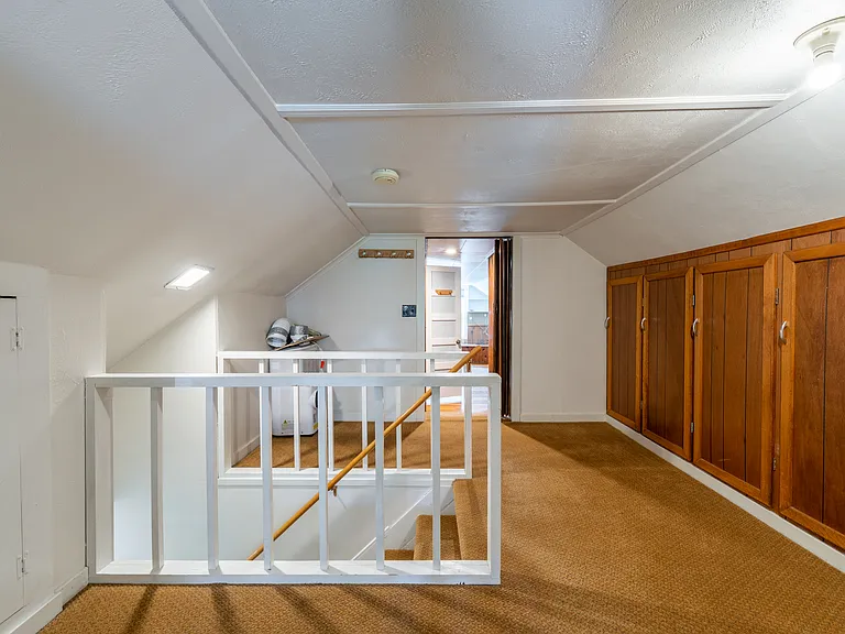 Upstairs sitting and storage area