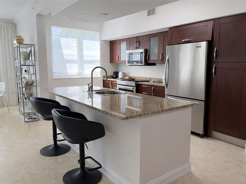 1st image of 20000 Country Club Dr #311