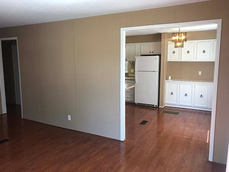Front living room showing dining room area.