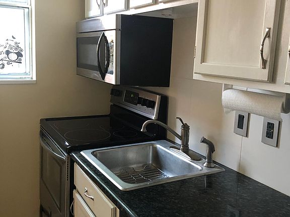 Kitchen with granite and stainless appliances
