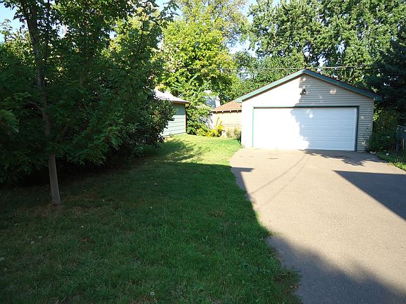 Back yard with garage