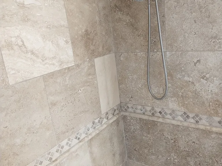 Front Bathroom Bathtub and shower sprayers shown.