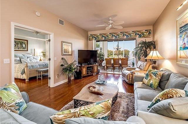 LIVING ROOM OPENS TO LG. LANAI