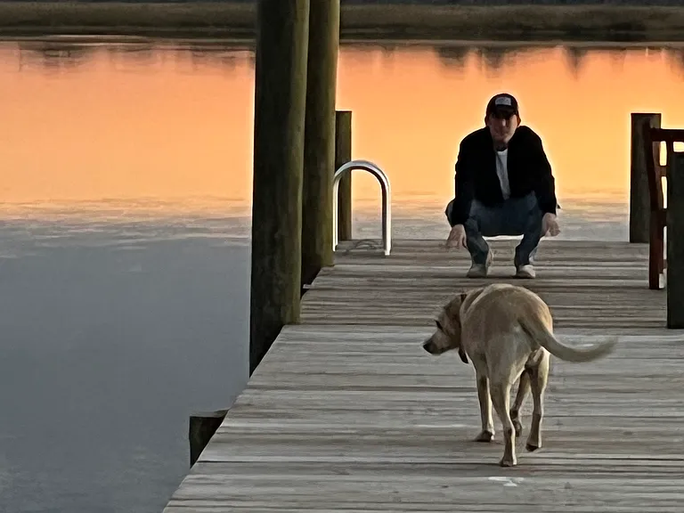 An evening stroll on the dock with Sugar and my son Michael.