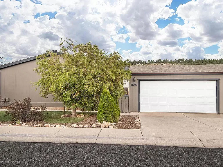 Front of Home with 2 car garage