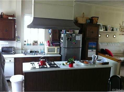Kitchen in back upstairs.  Note tall ceilings