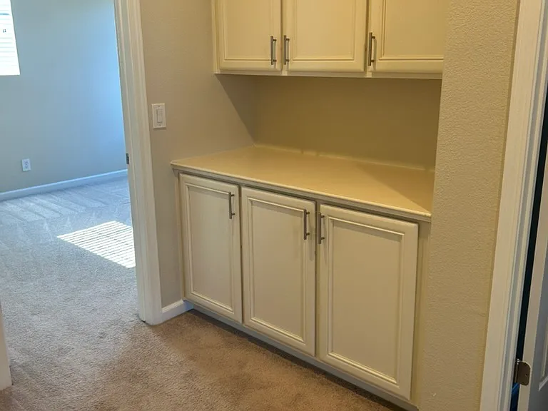 Upstairs hallway linen closet, freshly painted interiors