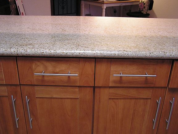 granite counter/cherry cabinet
