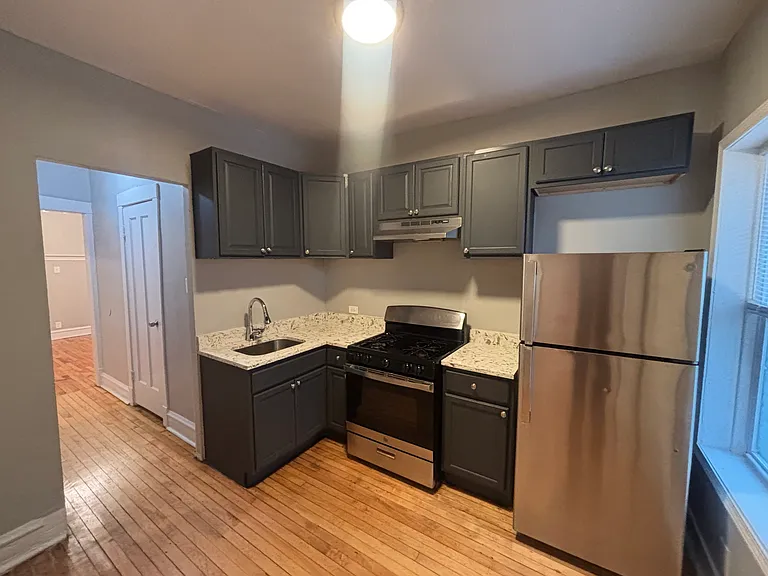 6525 S Evans Ave — Photo 6