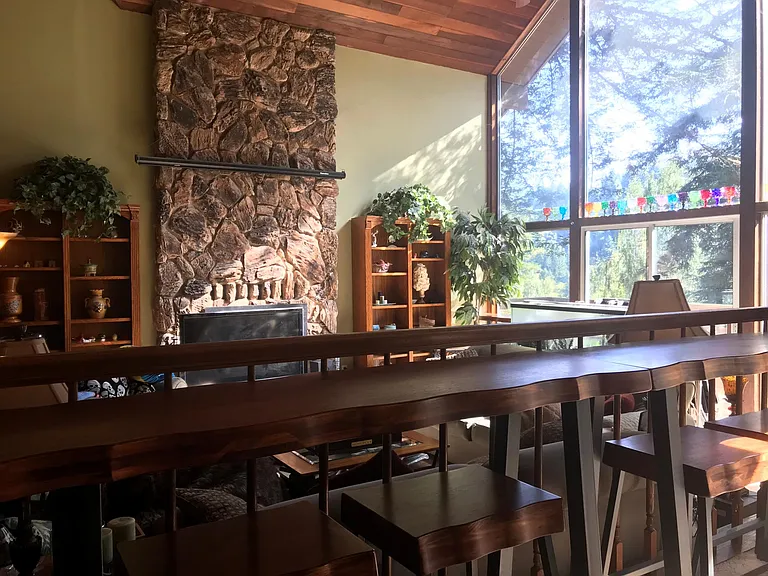 Living room with long bar and stools
