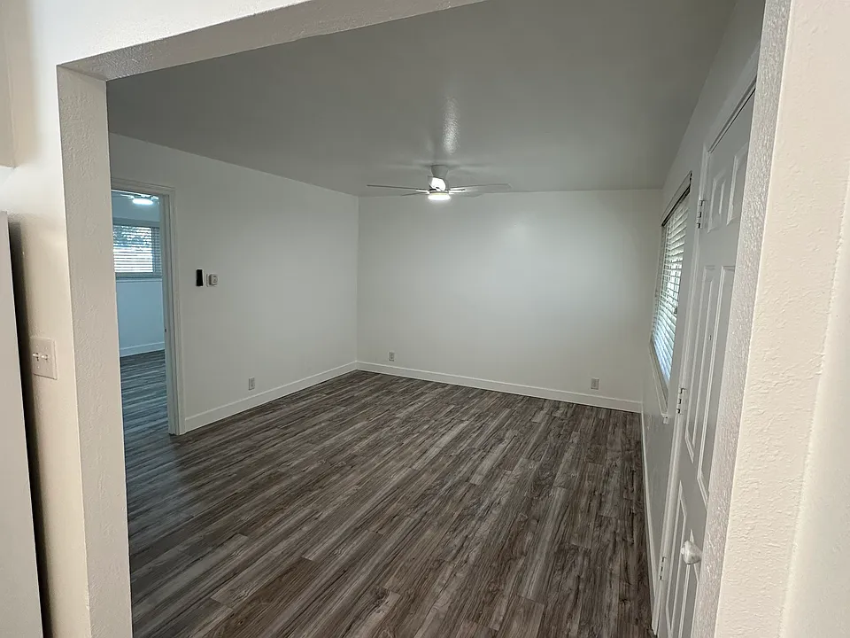 Living Room with entrance door on the right.