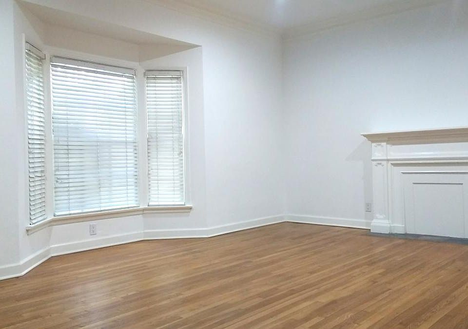 Large Living Area with Beautiful Faux Fireplace