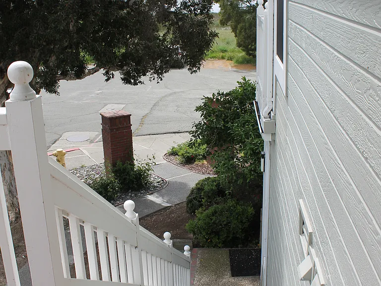 Steps down from front door