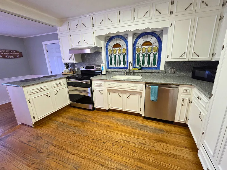Fully equipped kitchen with spacious cabinets