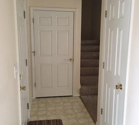 entry hallway that leads to garage for safety