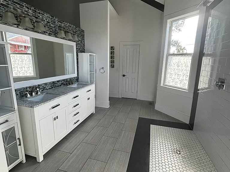 HUGE master bath with incredible waterfall shower.